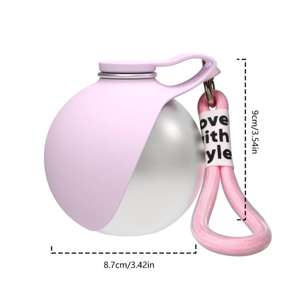 OrbSip in pink showing its 9 cm height and 8.7 cm width